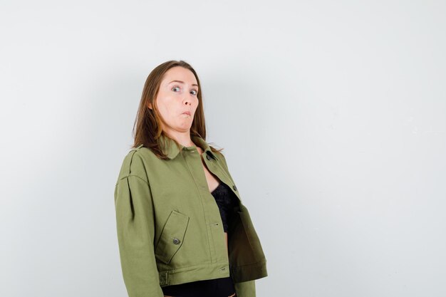 Expressive young girl posing in the studio