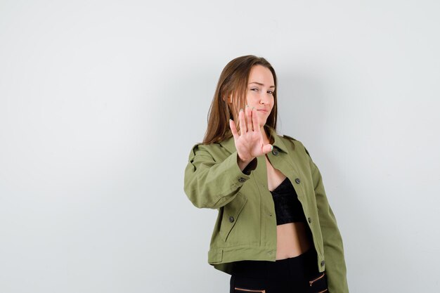 Expressive young girl posing in the studio