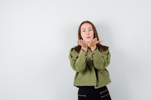 Expressive young girl posing in the studio