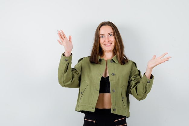 Expressive young girl posing in the studio