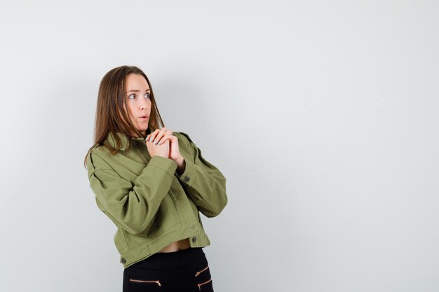 Expressive young girl posing in the studio