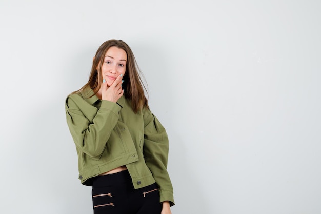 Expressive young girl posing in the studio