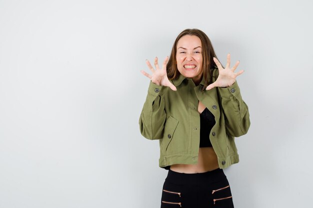 Expressive young girl posing in the studio