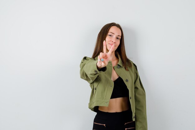 Expressive young girl posing in the studio