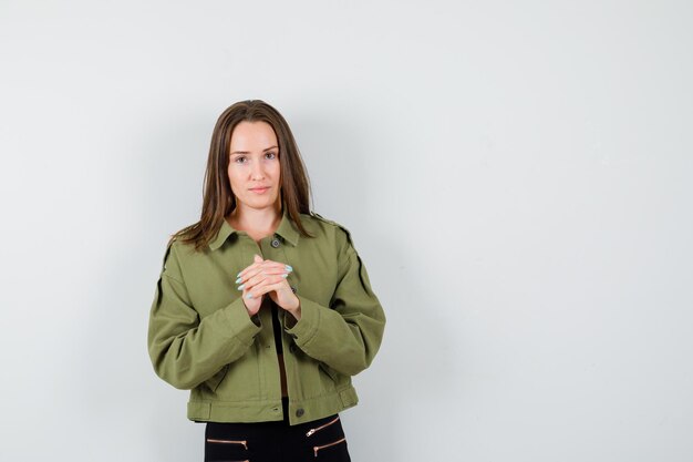 Expressive young girl posing in the studio