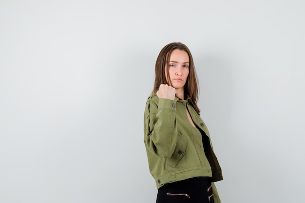 Expressive young girl posing in the studio