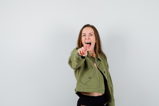 Expressive young girl posing in the studio