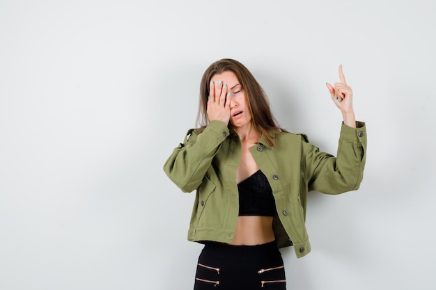 Expressive young girl posing in the studio