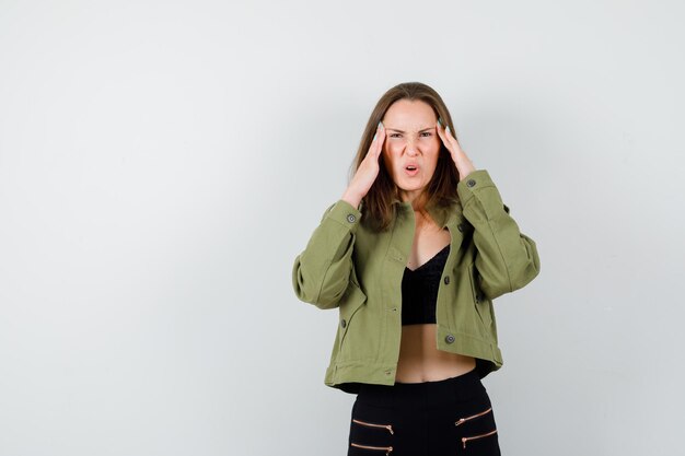 Expressive young girl posing in the studio