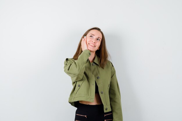 Expressive young girl posing in the studio