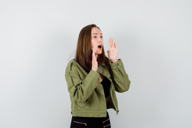 Expressive young girl posing in the studio