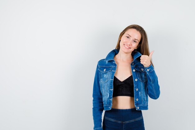 Expressive young girl posing in the studio