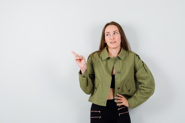 Expressive young girl posing in the studio