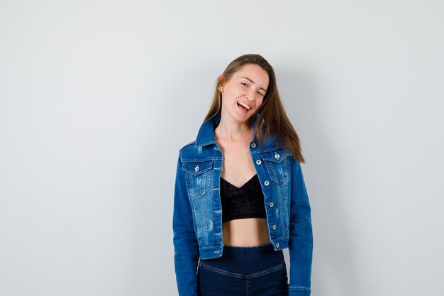 Expressive young girl posing in the studio