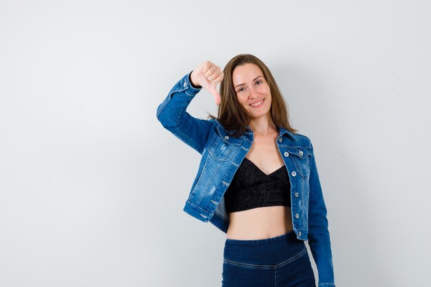 Expressive young girl posing in the studio