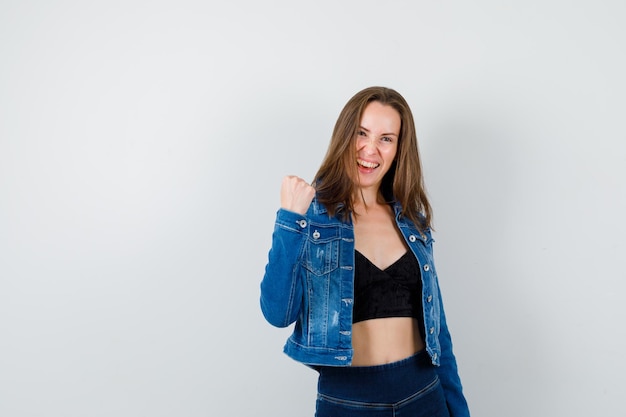 Expressive young girl posing in the studio