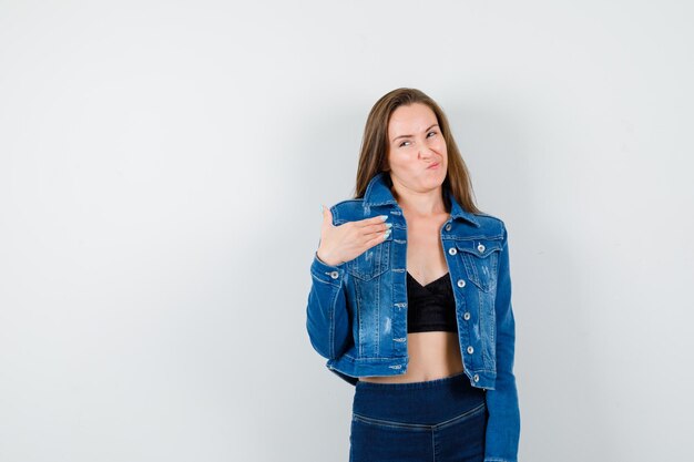 Expressive young girl posing in the studio