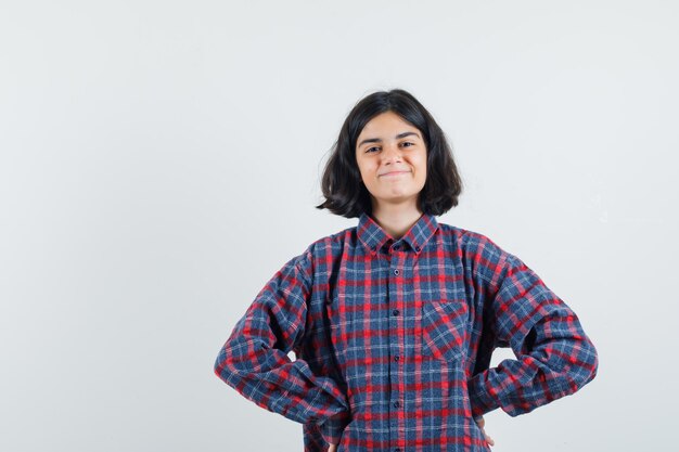 Expressive young girl posing in the studio