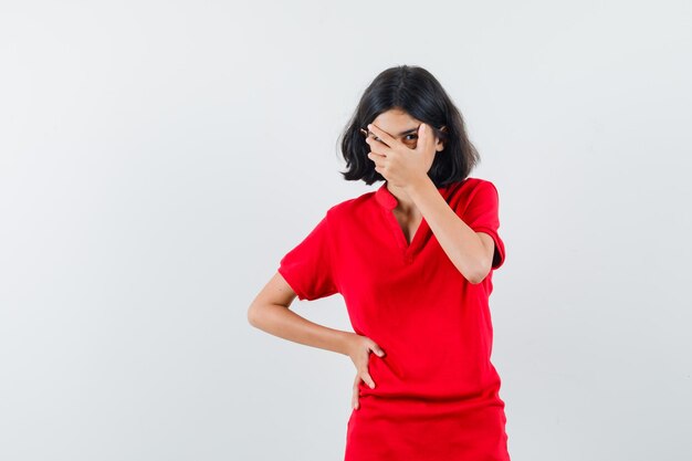 Expressive young girl posing in the studio