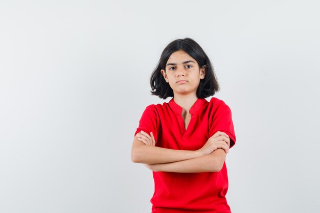 Expressive young girl posing in the studio