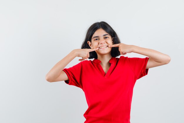 Expressive young girl posing in the studio