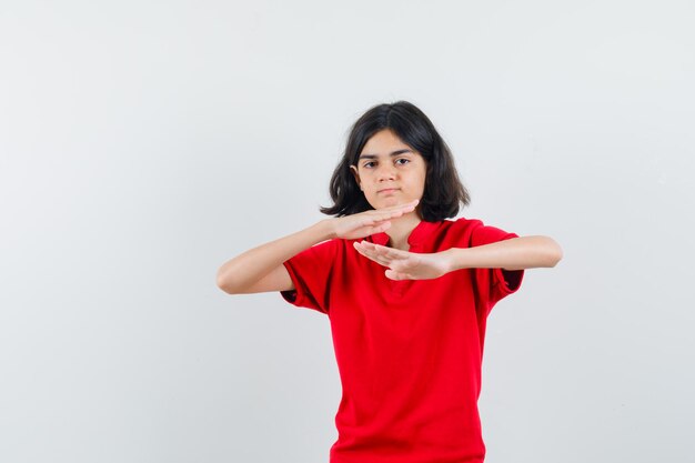 Expressive young girl posing in the studio