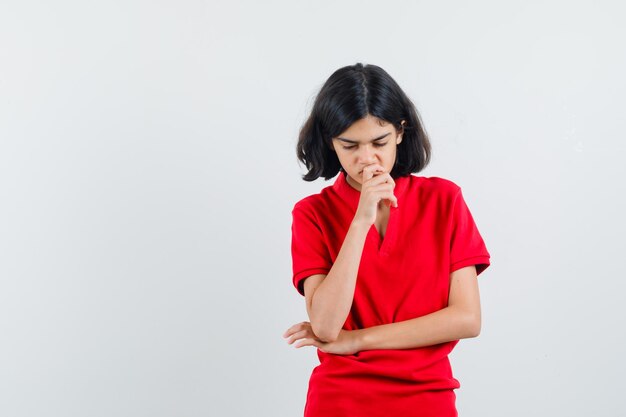 Expressive young girl posing in the studio