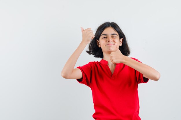 Expressive young girl posing in the studio