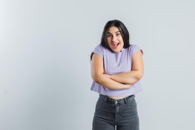 Expressive young girl posing in the studio