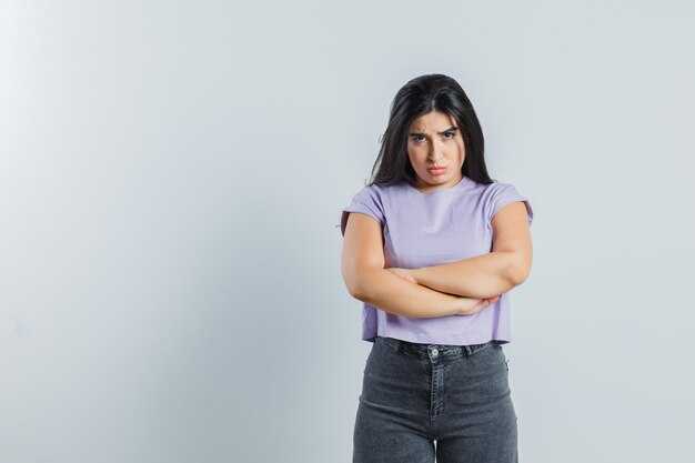 Expressive young girl posing in the studio