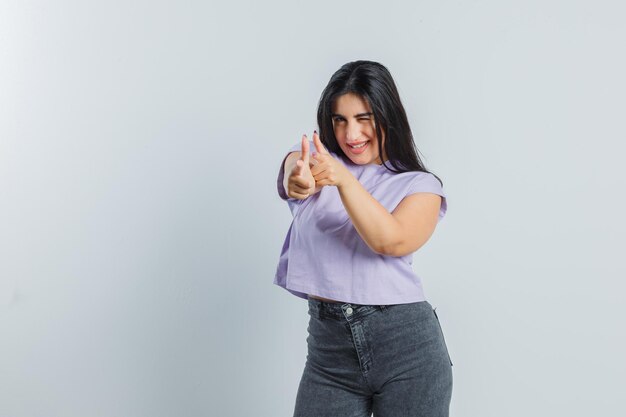 Expressive young girl posing in the studio