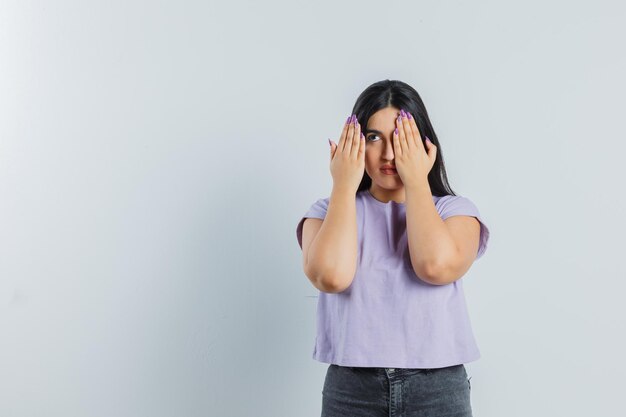 Expressive young girl posing in the studio