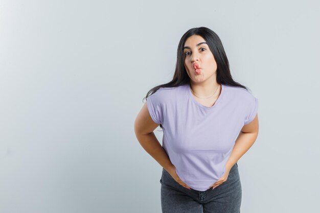 Expressive young girl posing in the studio