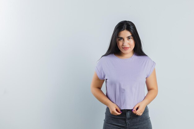 Expressive young girl posing in the studio