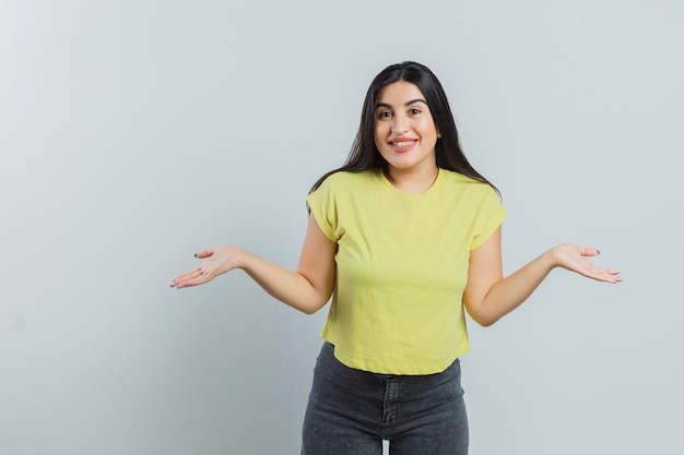 Expressive young girl posing in the studio