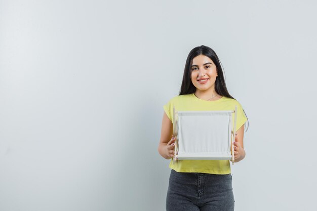 Expressive young girl posing in the studio