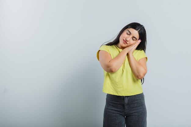 Expressive young girl posing in the studio