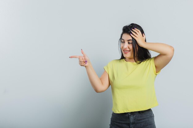 Expressive young girl posing in the studio