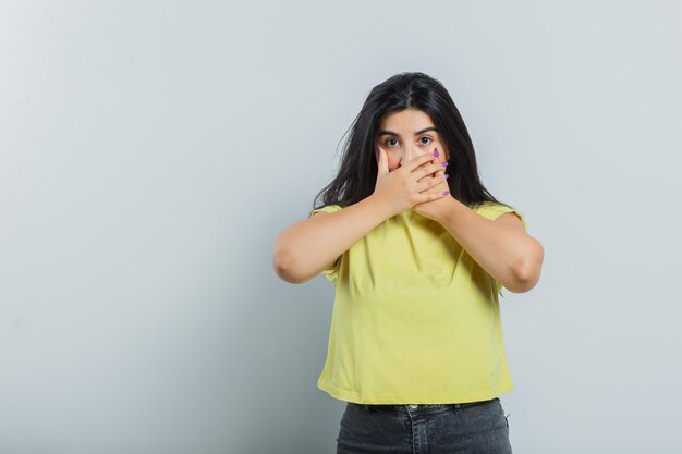 Expressive young girl posing in the studio