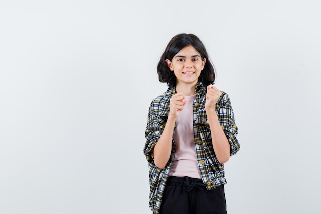 Expressive young girl posing