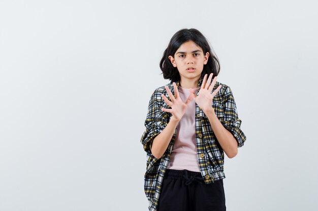 Expressive young girl posing