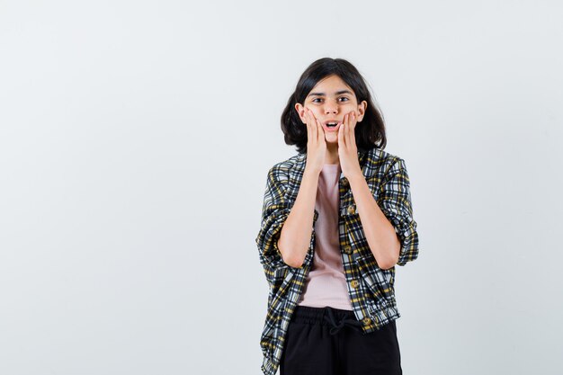 Expressive young girl posing