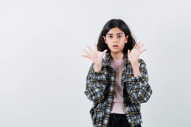 Expressive young girl posing