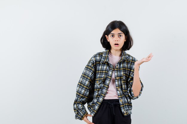 Expressive young girl posing