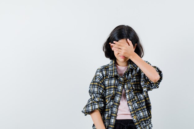 Expressive young girl posing