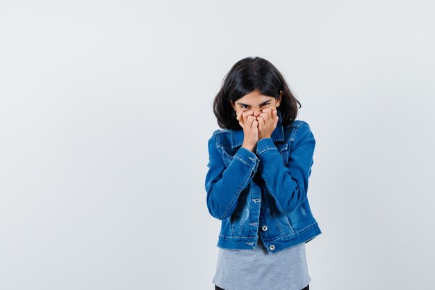 Expressive young girl posing