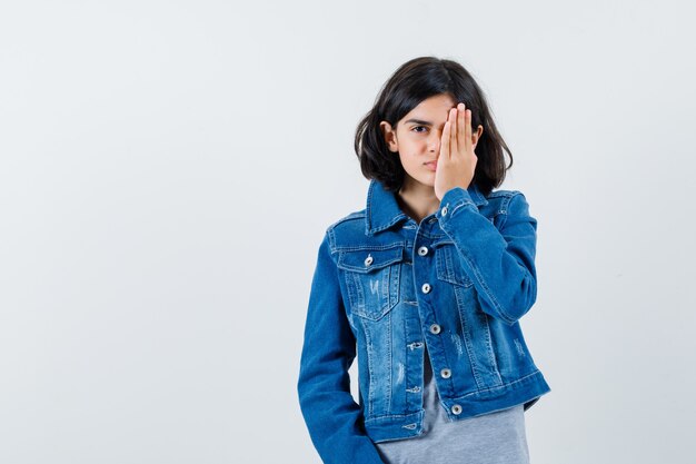 Expressive young girl posing