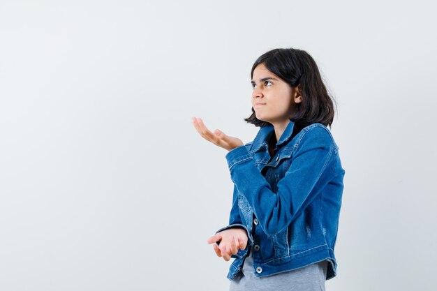 Expressive young girl posing