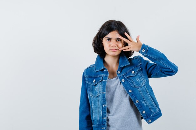 Expressive young girl posing