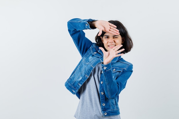 Expressive young girl posing